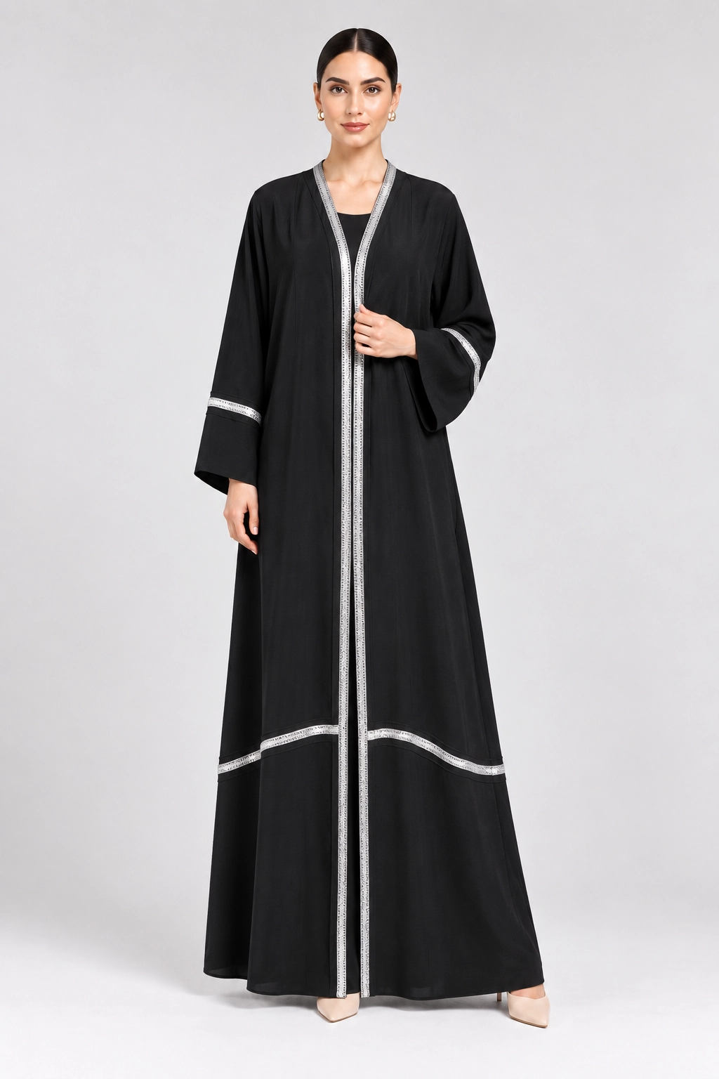 17 (1) Women's Elegant Black Open-Front Abaya with Silver Decorative Trim – Stylish V-Neck, Wide Sleeves, Contrasting Hemline Borders, Full-Length Modest Outerwear for Eid, Ramadan & Special Occasions - Image 1