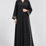 Women's Elegant Black Abaya with Beige Floral & Geometric Detailing – V-Neck, Front Button Design, Wide Patterned Sleeves, Full-Length Modest Maxi Dress for Eid, Ramadan & Everyday Wear