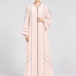 Women's Elegant Blush Pink Abaya with Black Contrast Piping – V-Neck, Wide Kimono Sleeves, Geometric Side Panel Design, Full-Length Flowing Modest Maxi Dress for Eid, Ramadan & Everyday Wear