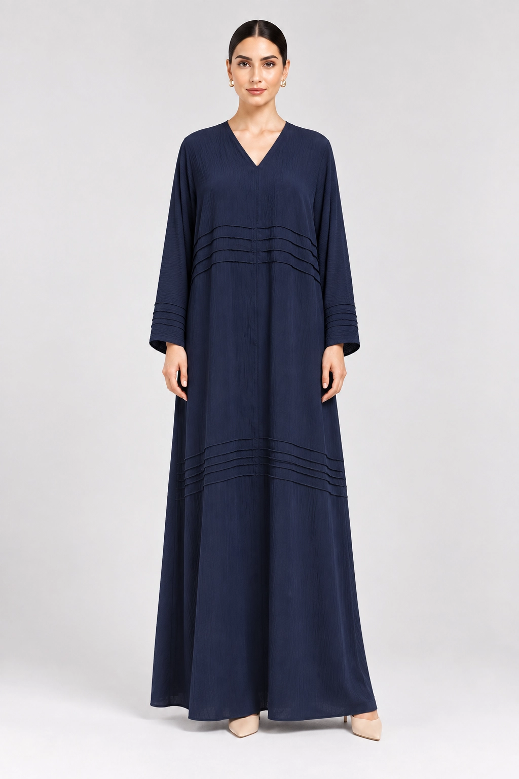 navy-blue-single-abaya-front Navy blue single abaya for women with V-neckline and horizontal pintuck-style detailing, front view
